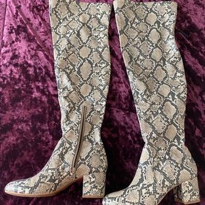 Snakeskin print knee high boots!